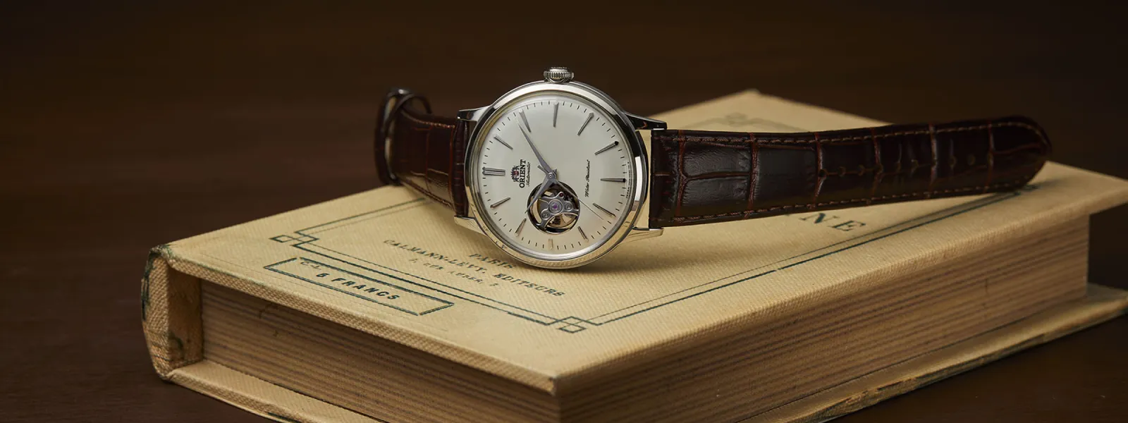Watch on top of a book